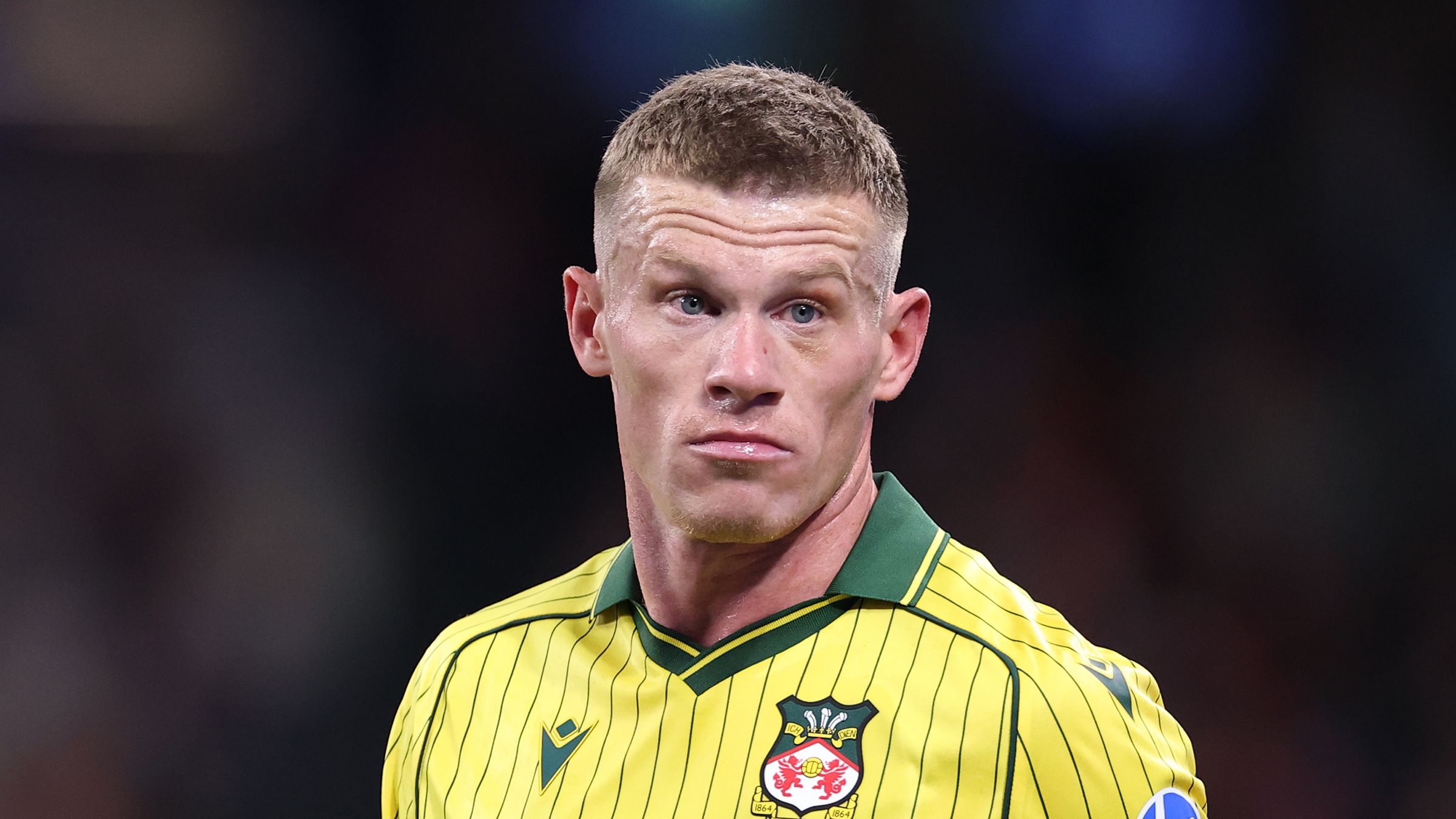 Wrexham talisman Ollie Rathbone rushed to hospital after nightmare injury blow in pre-season loss to Sydney FC as Phil Parkinson delivers worrying update