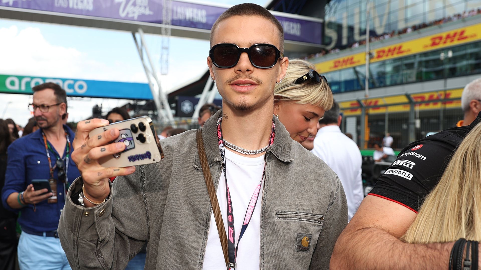 Don't Look Back In Anger! Romeo Beckham spotted at Oasis gig with Man City star