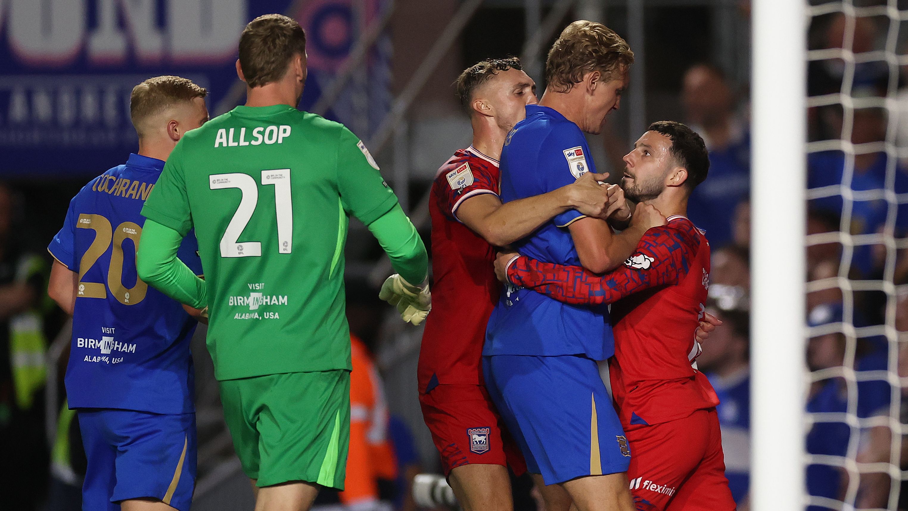 VIDEO: Birmingham fan jumps barrier in effort to fight Ipswich players as Tom Brady's Blues kick off Championship return with feisty draw