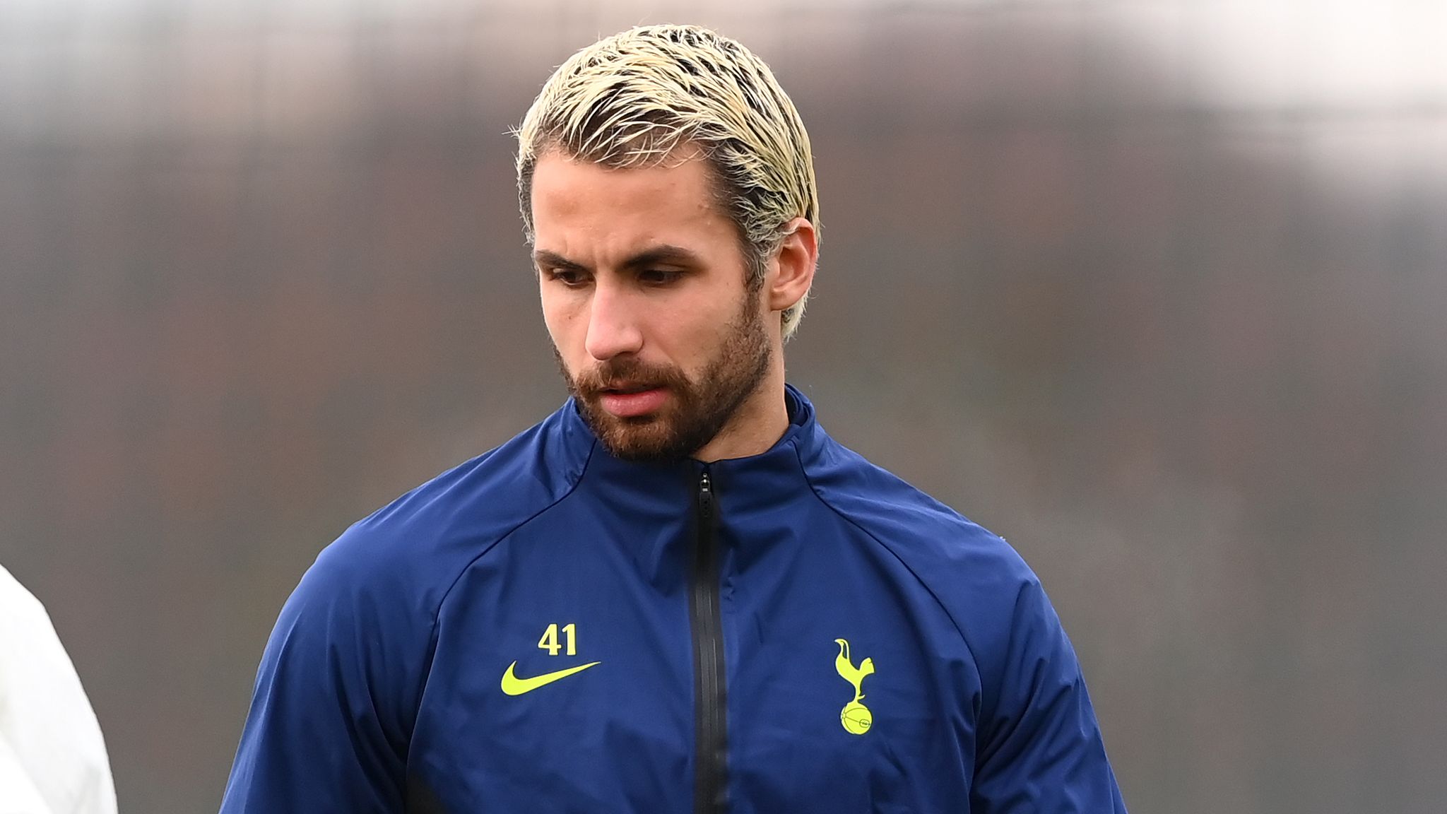 Former Tottenham ace retires to become a director and photographer as he reveals pursuit of happiness away from football