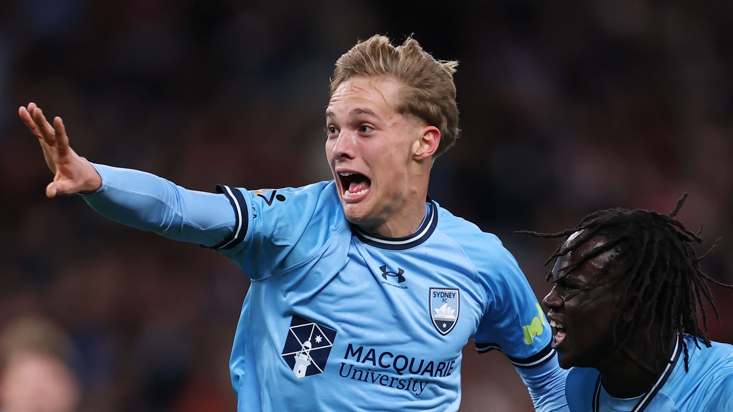 Wrexham let down by fumbling goalkeeper Callum Burton in disappointing pre-season loss to Sydney FC as worrying Ollie Rathbone injury compounds misery for Ryan Reynolds and Rob McElhenney