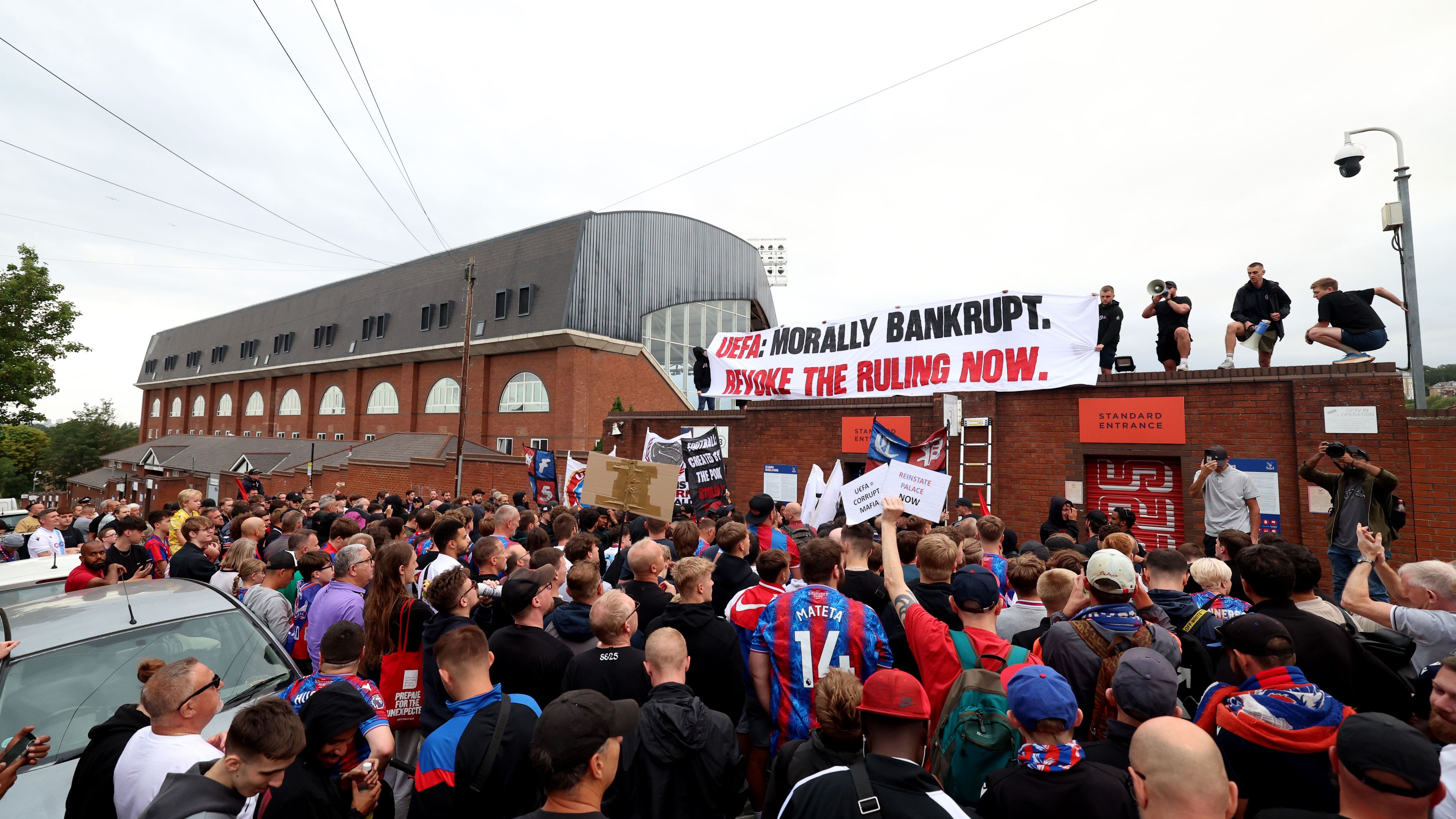 Crystal Palace fans protest against 'morally bankrupt' UEFA after FA Cup winners kicked out of Europa League due to ownership rules