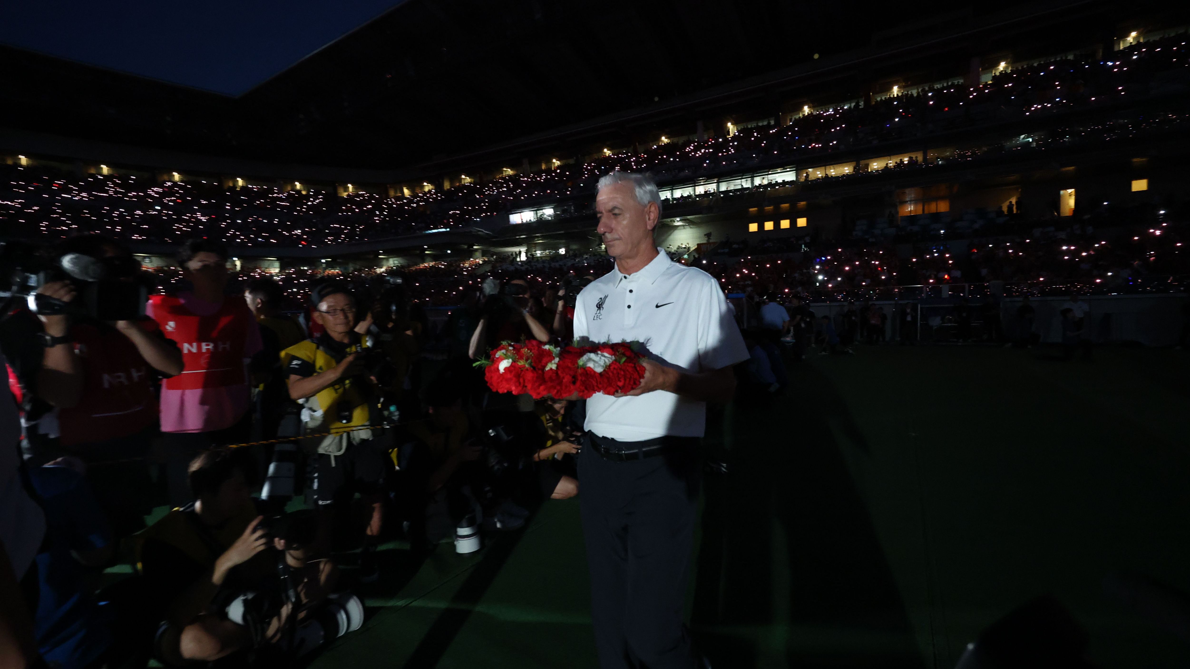 Liverpool legend Ian Rush takes part in moving Diego Jota tribute at Nissan Stadium in Yokohama as fans create incredible phone light backdrop