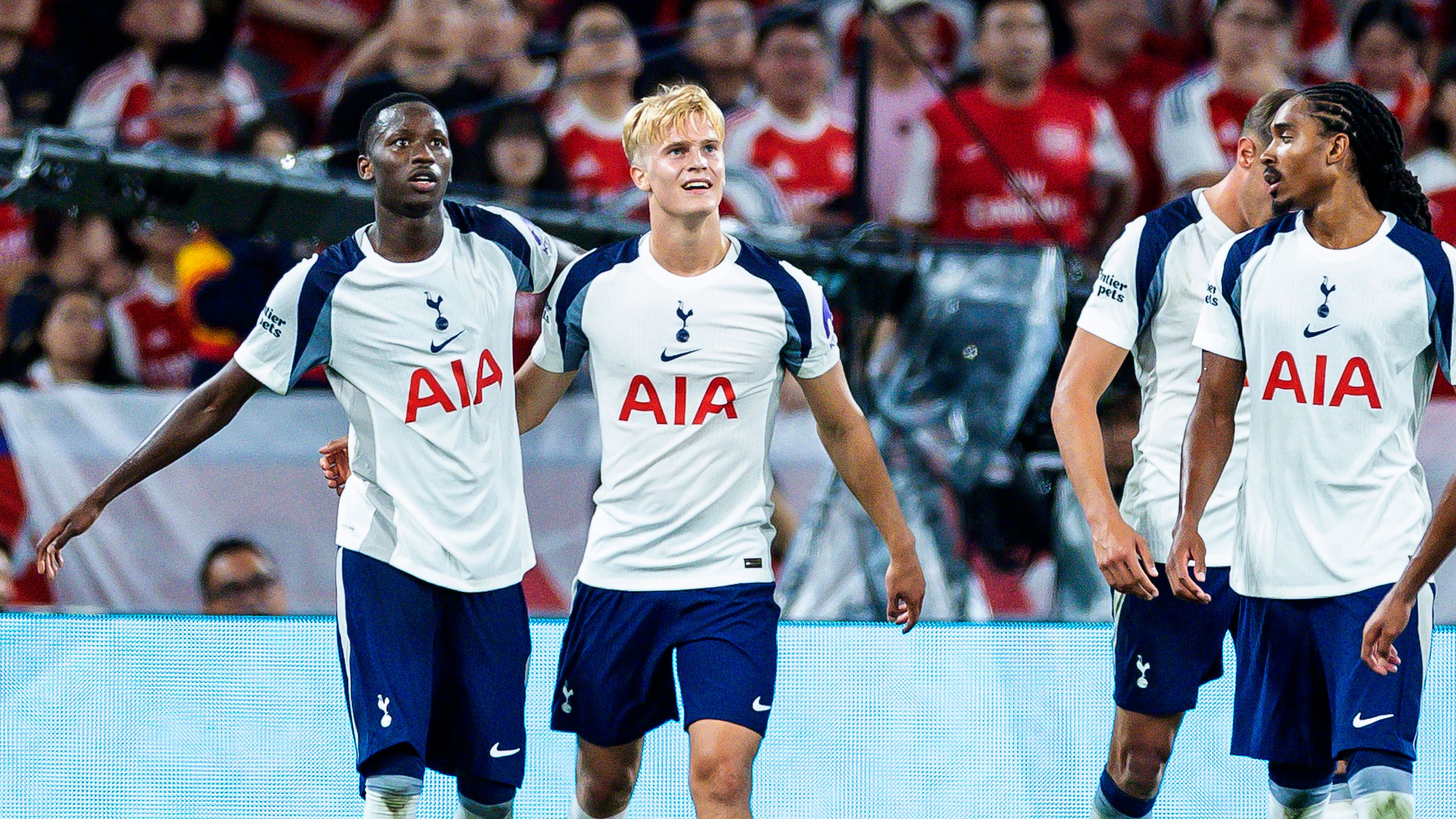 VIDEO: Pape Matar Sarr, take a bow! Tottenham star lobs David Raya to score incredible goal from just outside centre circle as Arsenal stunned in pre-season derby clash