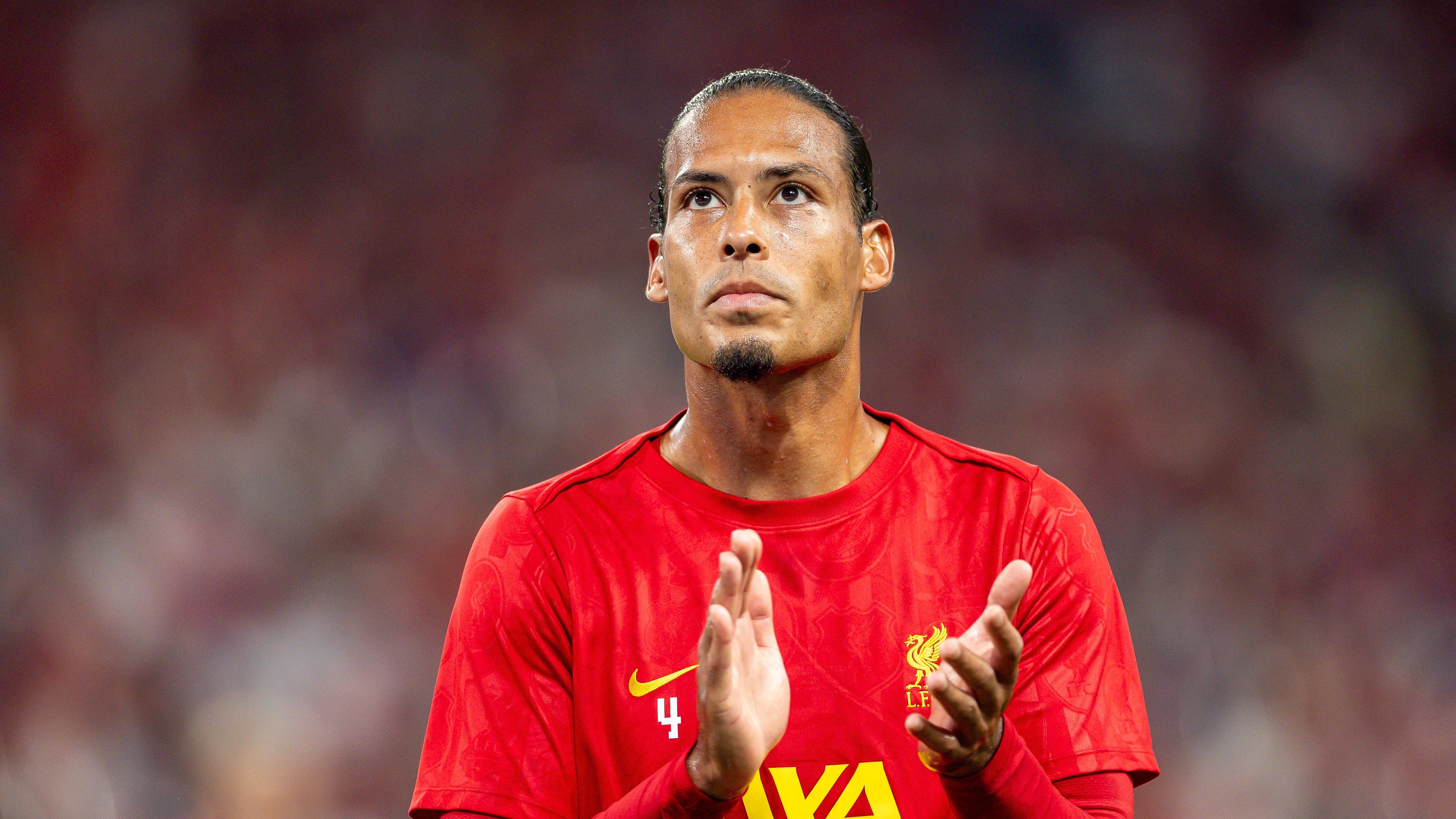Vigil van Dijk admits it has been 'surreal' for Liverpool players to 'carry on with work' after Diogo Jota's tragic death as Reds aim to honour late striker on the pitch