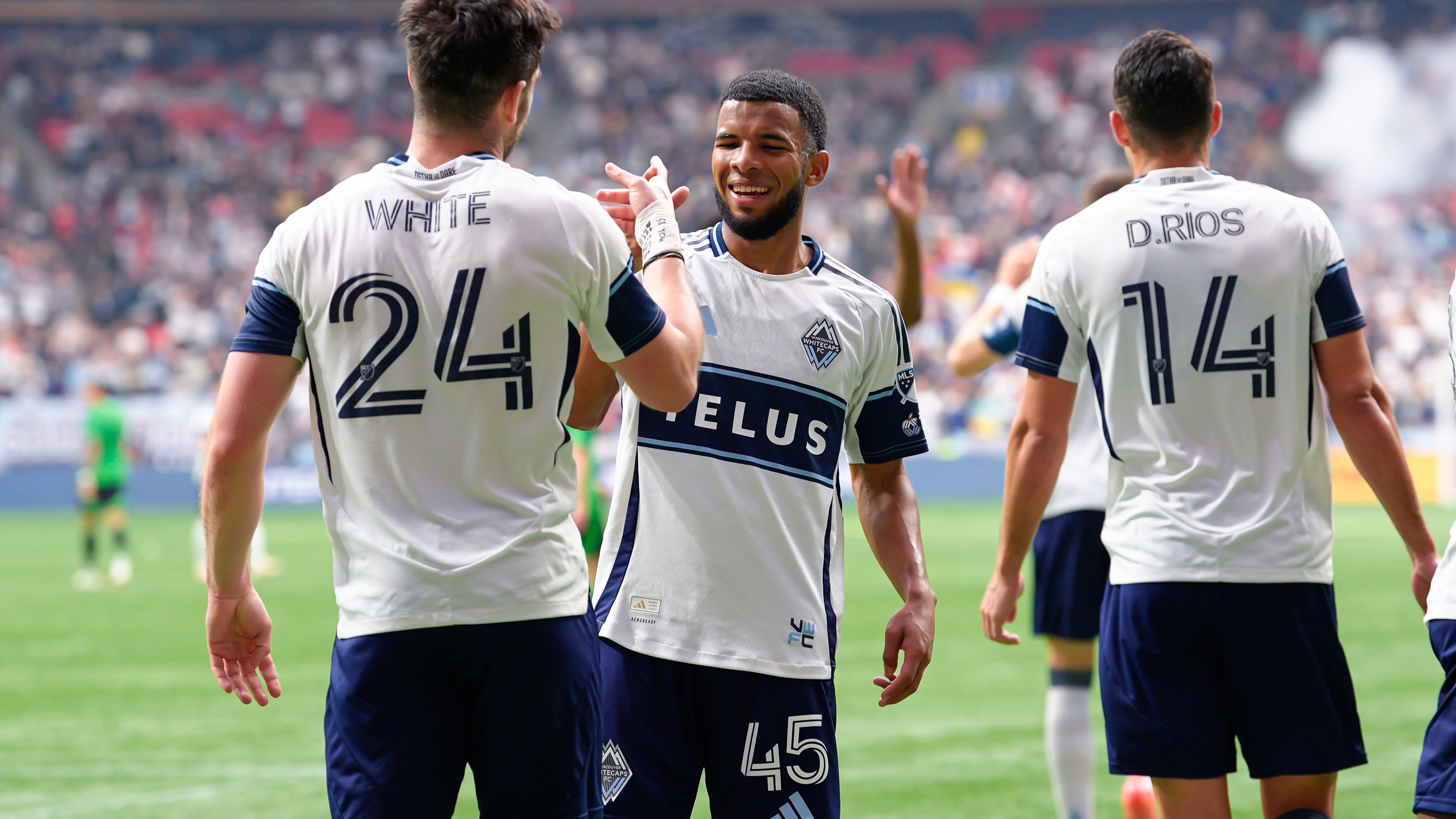 Thomas Muller gets a hero's welcome as Vancouver Whitecaps go wild for Bayern Munich legend after he arrives in Canada