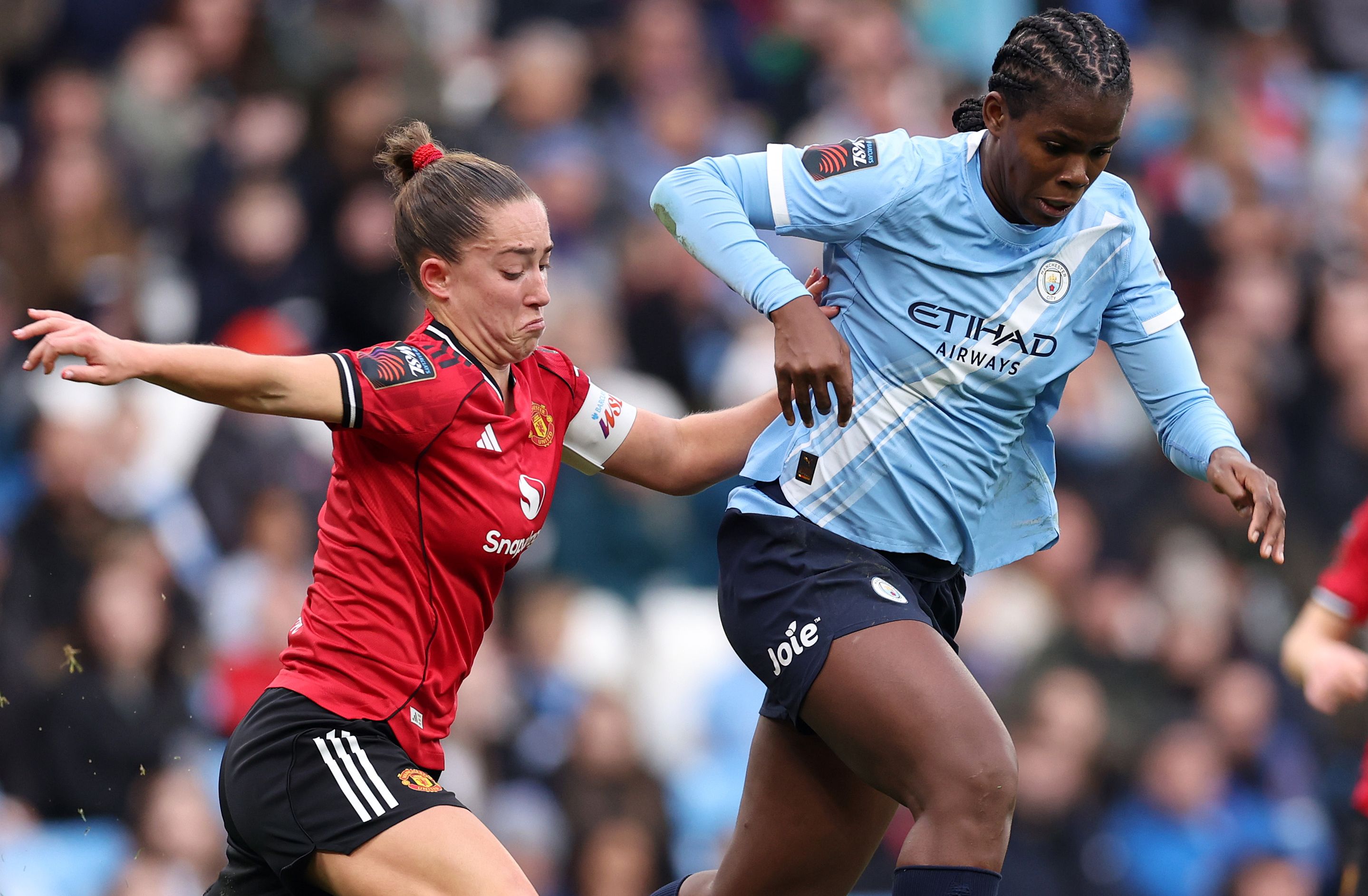 Man City women's player ratings vs Man Utd: Lauren Hemp's back with a bang! Lioness lashes home to deliver big blow to Red Devils' WSL title hopes as Bunny Shaw makes goalscoring look easy