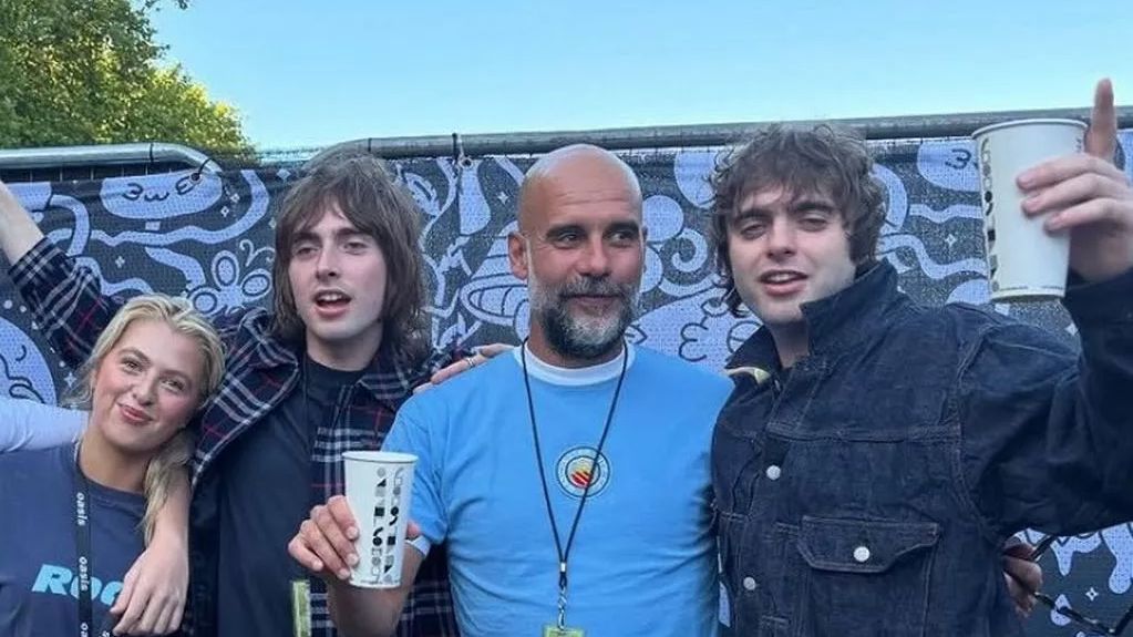 VIDEO: Pep Guardiola belts out Oasis hit 'Don't Look Back in Anger' as Man City boss attends Heaton Park <a href=
