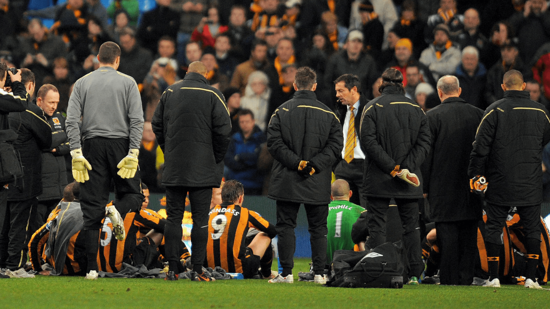 Former Premier League boss conducts post-match team talk on the pitch after thumping defeat in opening round of Championship fixtures