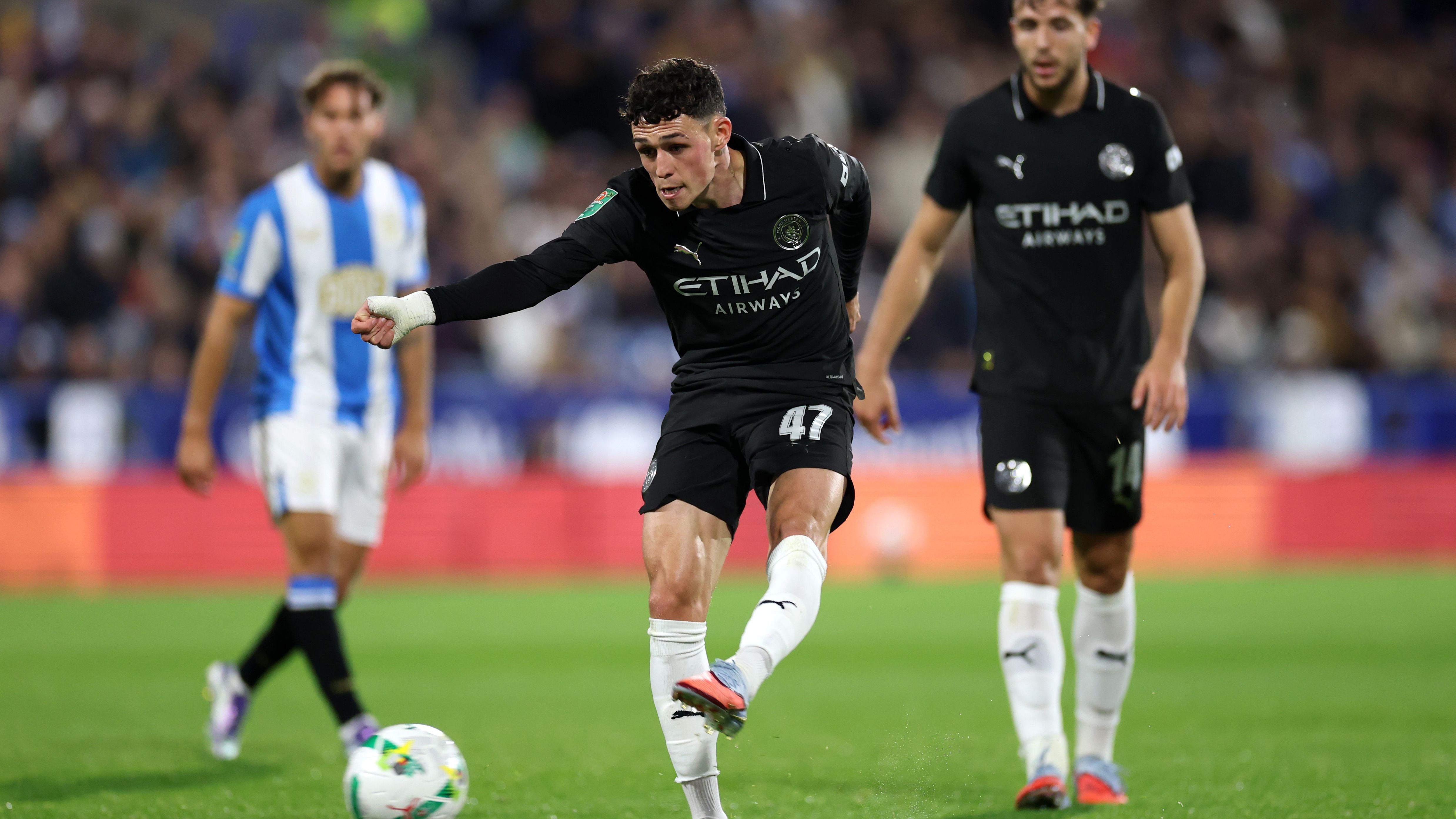 Man City player ratings vs Huddersfield Town: Phil Foden is on fire! Midfielder guides Pep Guardiola's side to Carabao Cup win with goal and assist as Kalvin Phillips make surprise return