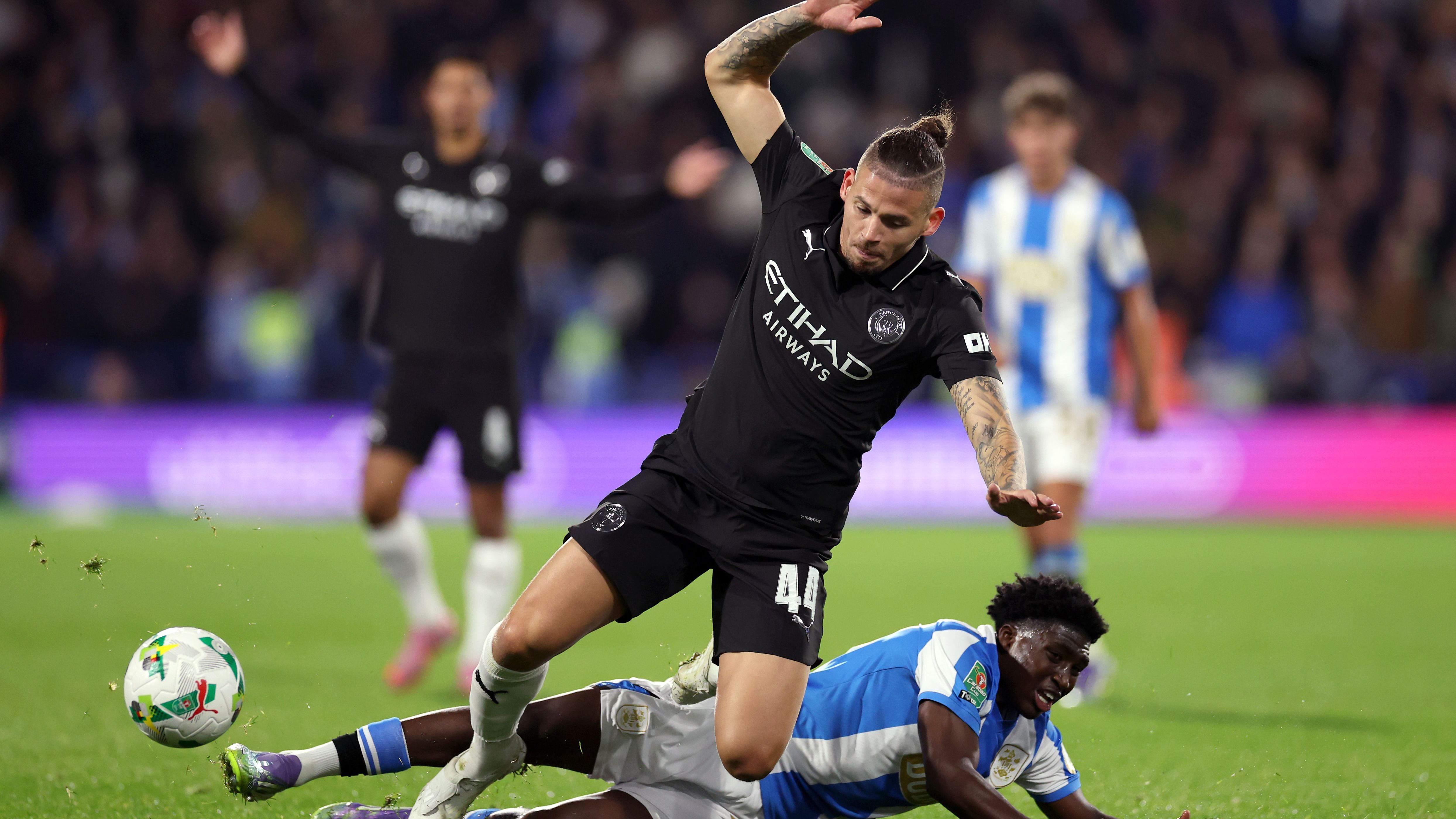 Man City player ratings vs Huddersfield Town: Phil Foden is on fire! Midfielder guides Pep Guardiola's side to Carabao Cup win with goal and assist as Kalvin Phillips make surprise return