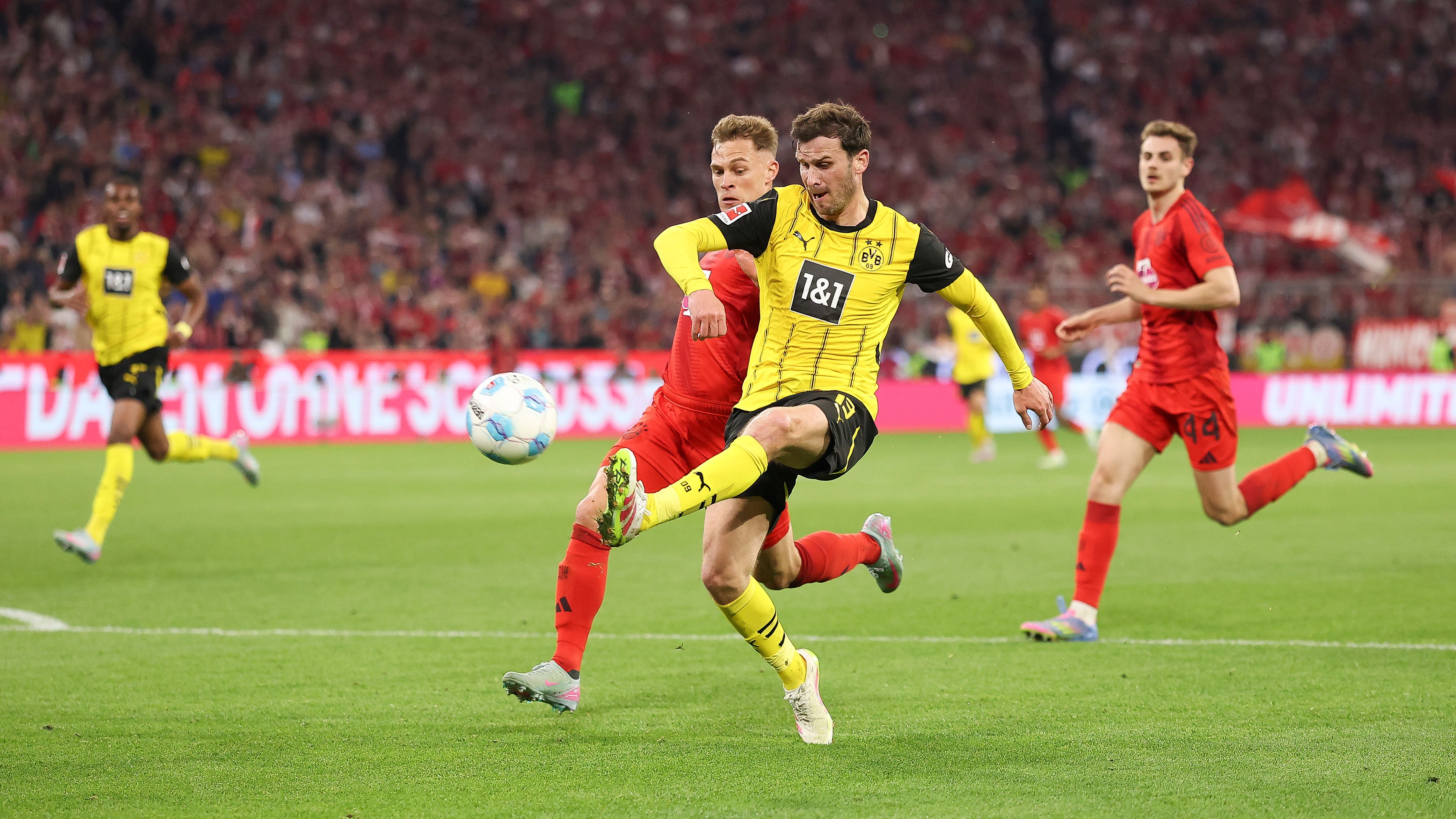 Borussia Dortmund eager to tie 'future captain' to new contract but Germany legend urges defender to make Bayern Munich transfer instead