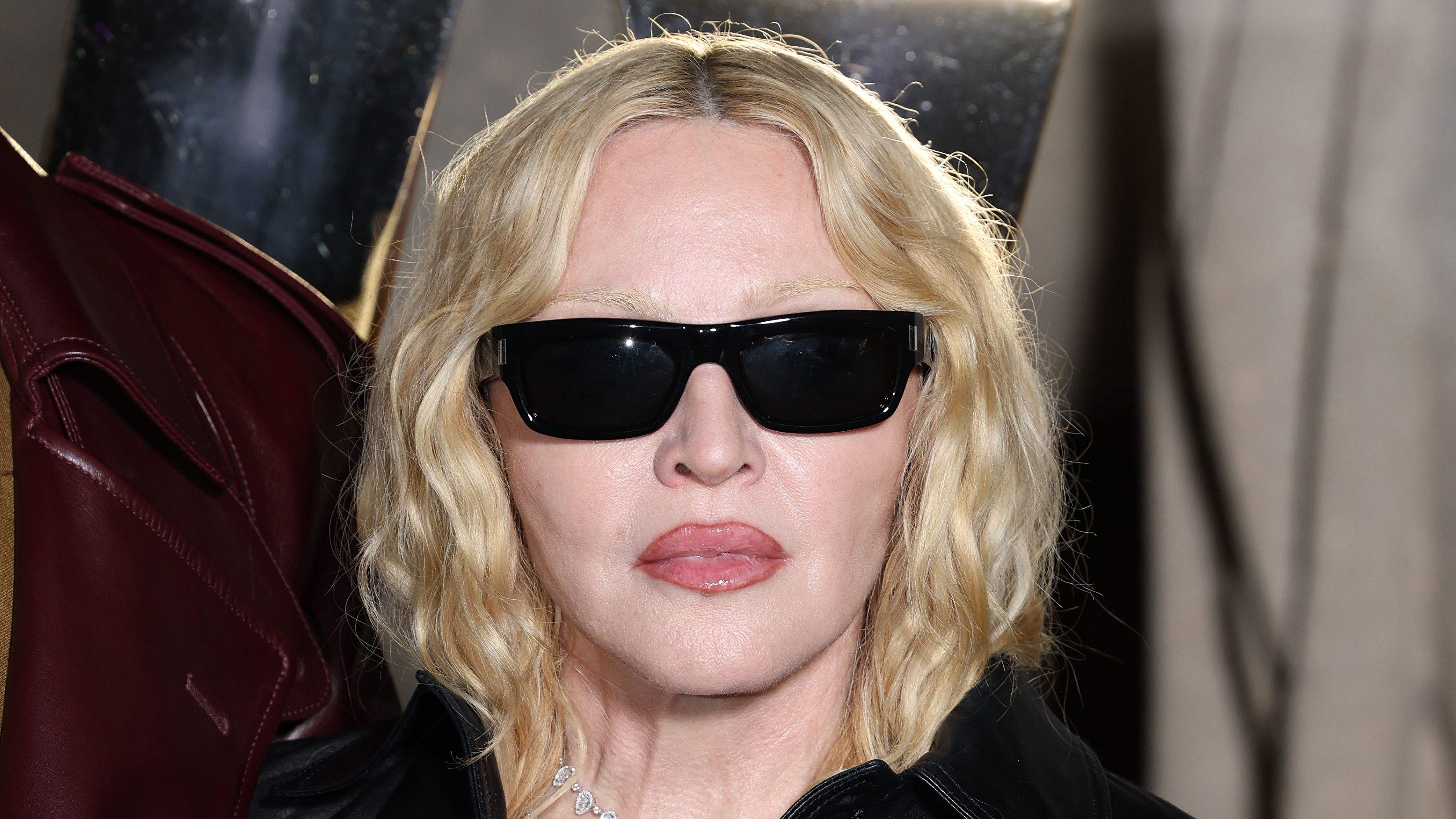 Madonna is a Chelsea fan?! Queen of pop spotted at Stamford Bridge to watch Blues take on Liverpool in Premier League clash