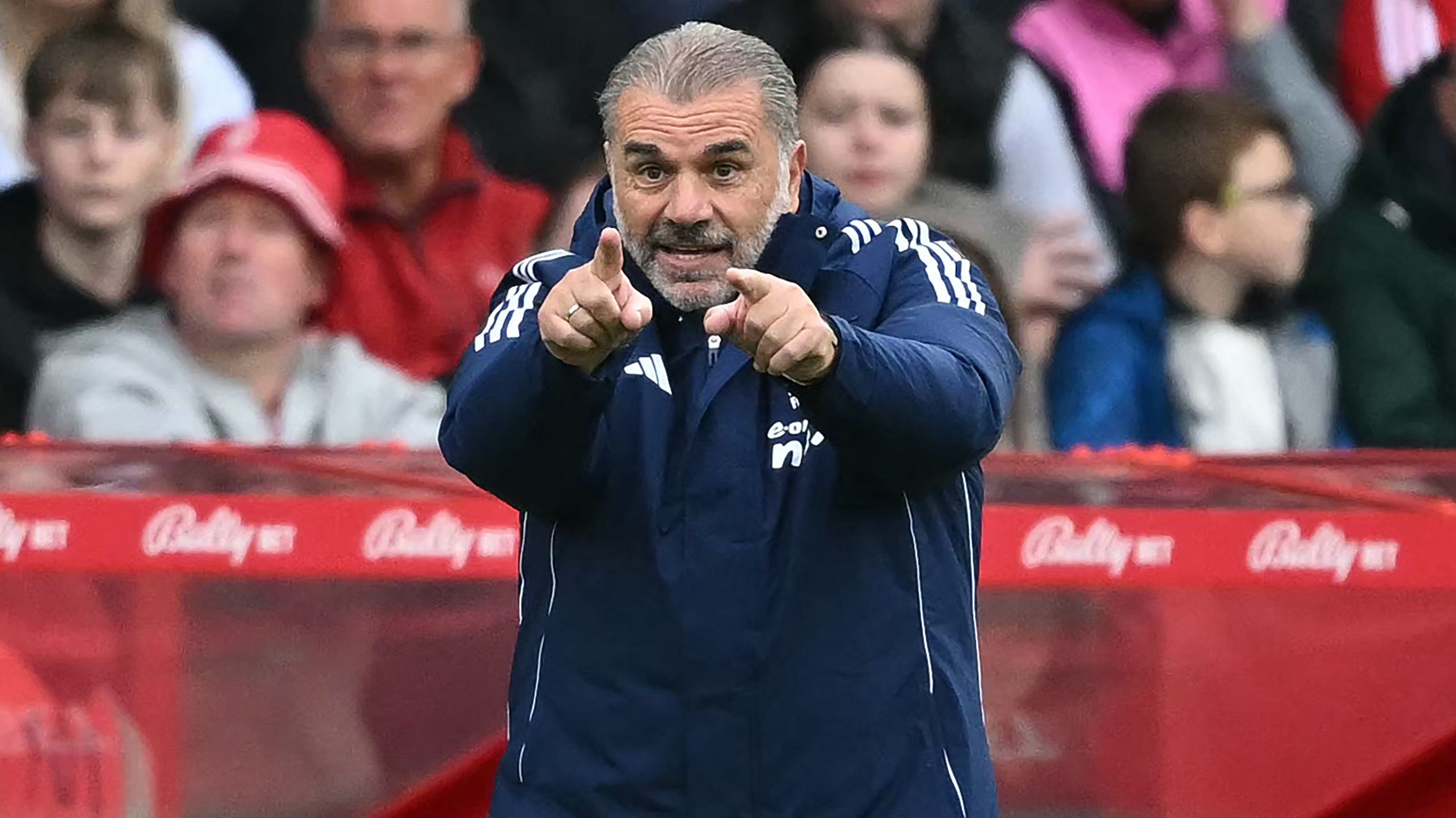 Ange Postecoglou stops for fan selfie after being sacked in the wake of Nottingham Forest's defeat to Chelsea