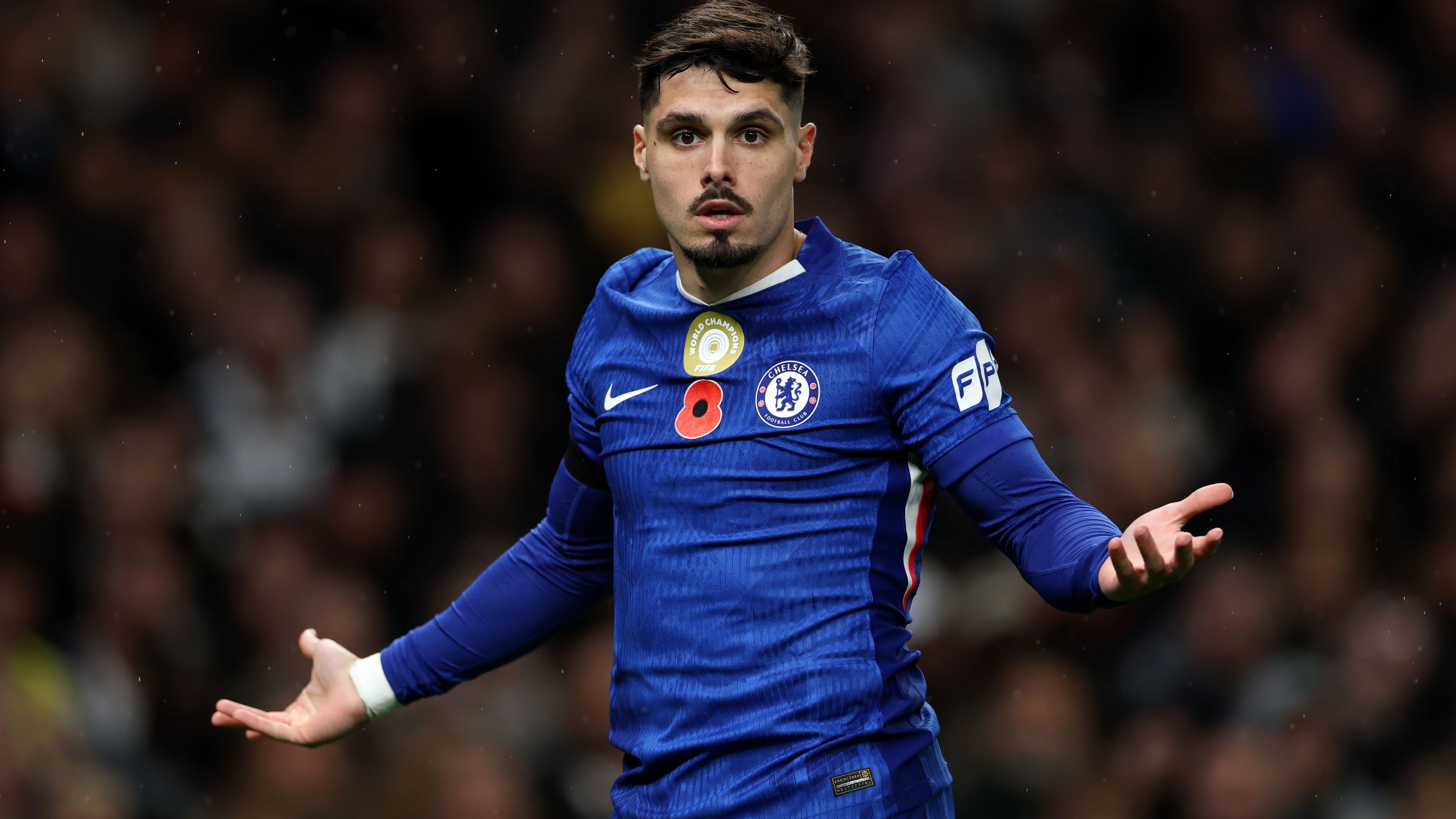 VIDEO: 'F*ck you!' - Chelsea star Pedro Neto caught on camera rage-baiting Tottenham fans with X-rated antics on bench late in Blues' victory over Spurs