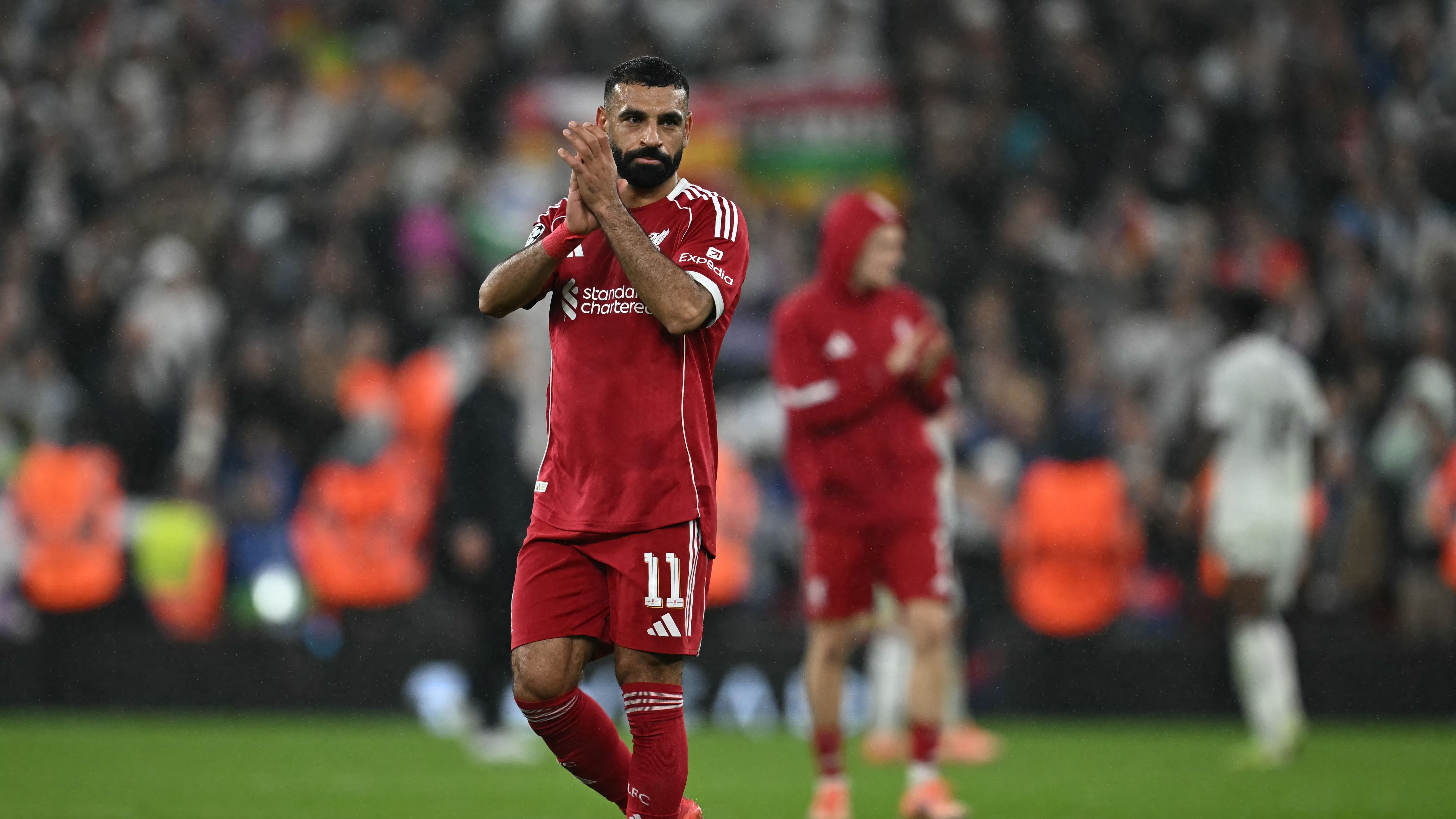 Virgil van Dijk fires back at Wayne Rooney's 'over-the-top' criticism in awkward live TV exchange after Liverpool down Real Madrid in the Champions League